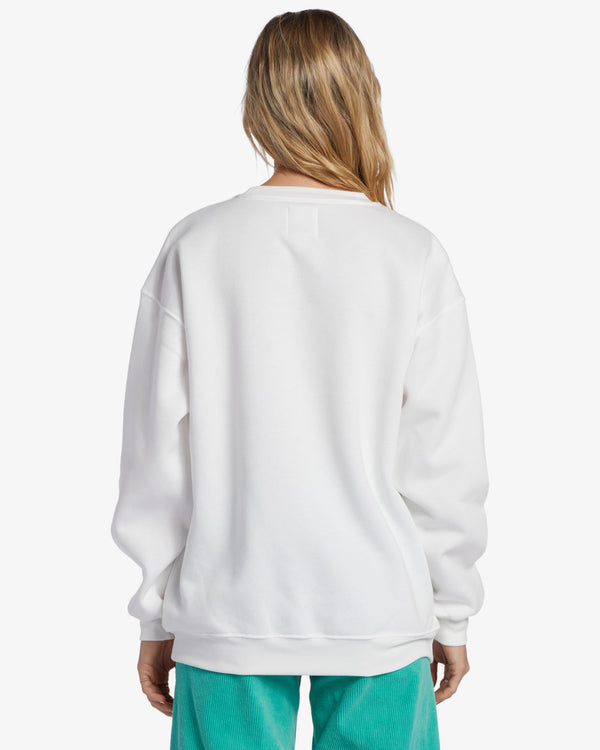 back view of the model wearing the sunny days sweatshirt. shows the dropped shoulders. also shows the crew neckline and regular fit. 