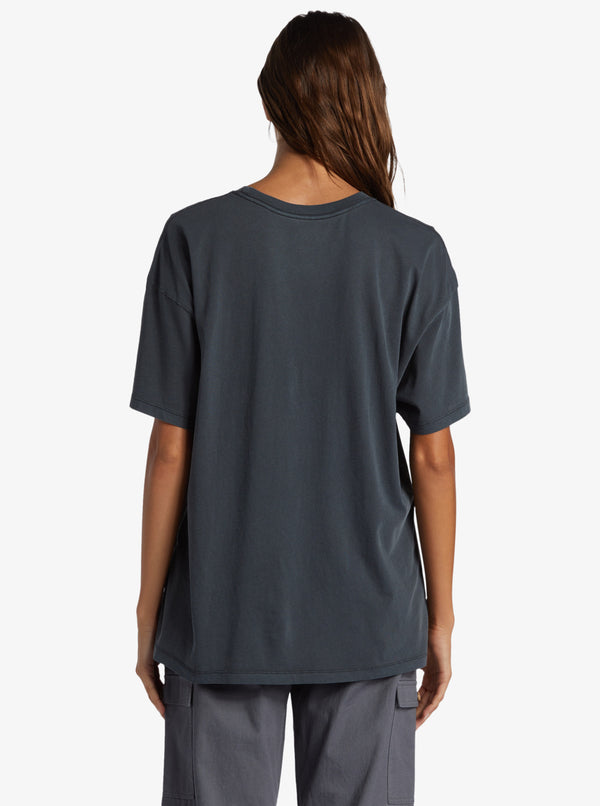 back view of the model wearing the beachy days t shirt. shows the dropped shoulders.  Also shows the crew neckline and the oversized fit. 