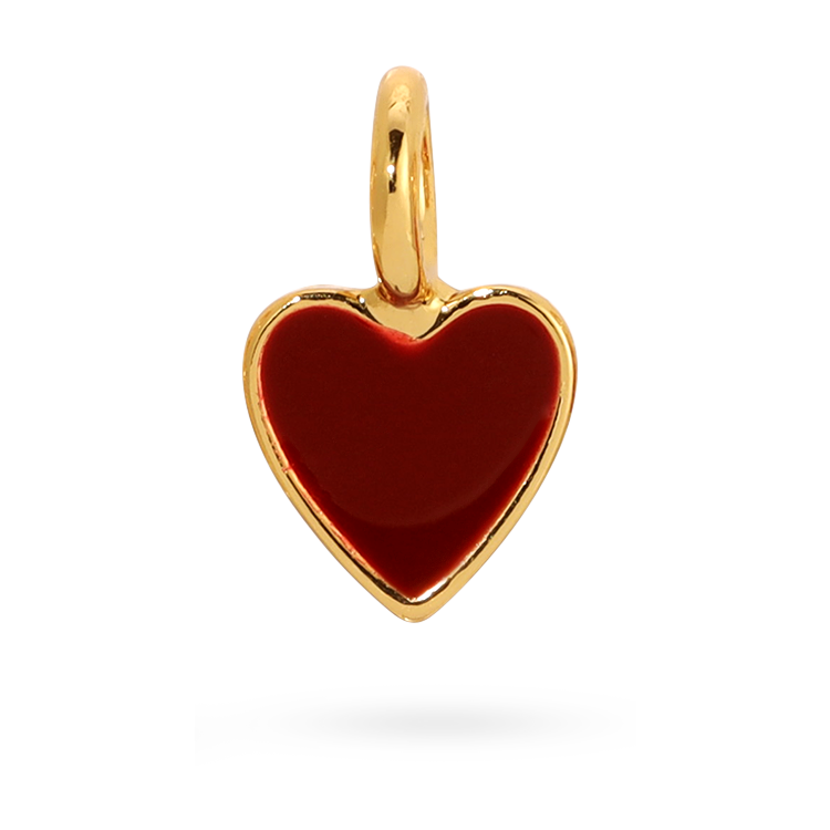 Shows the gold heart charm by itself. Shows the gold heart charm that is red. 
