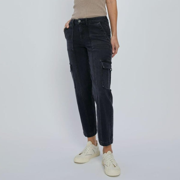 front view of the model wearing the tracey cropped cargos. shows the side cargo pockets. also shows the front patch pockets, the button closure and defined seaming. 