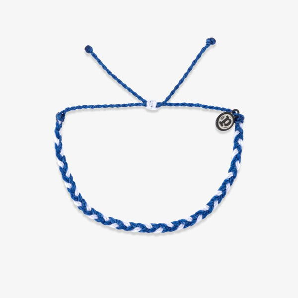 Blue and white braided bracelet on a white background