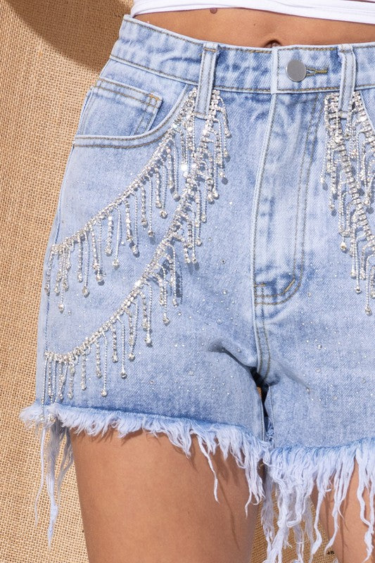 side view of denim shorts with rhinestone swags down the sides