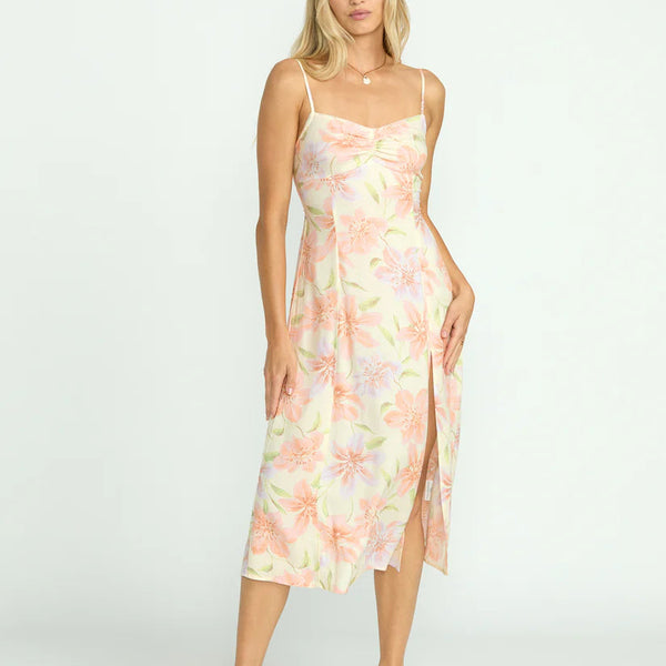 front view of the sunset love dress. shows the sweetheart neckline. also shows the midi length, the front slip and the thin straps. 