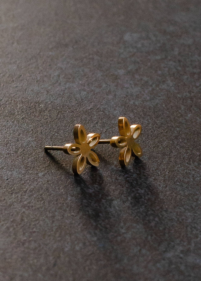 side view of the flower studs. shows the gold color, the stud backing and the five little loops. 