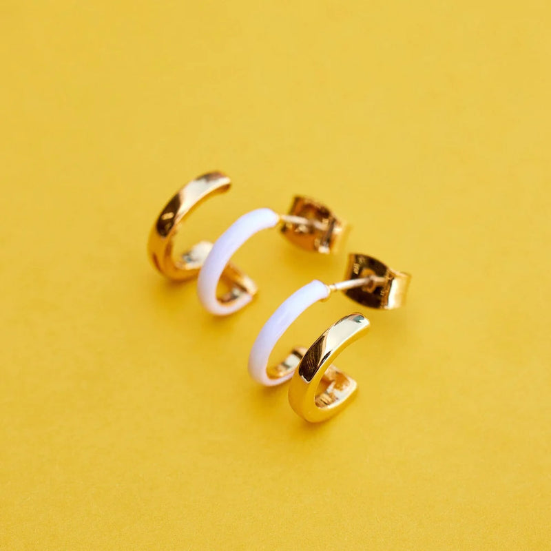 Shows gold colorway earring on flat surface. Brass post is shown.
