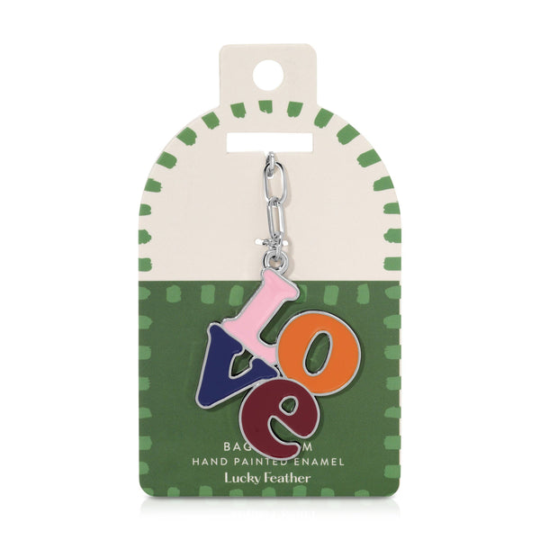 Colorful 'LOVE' keychain on a green and beige card with 'Lucky Feather' branding.
