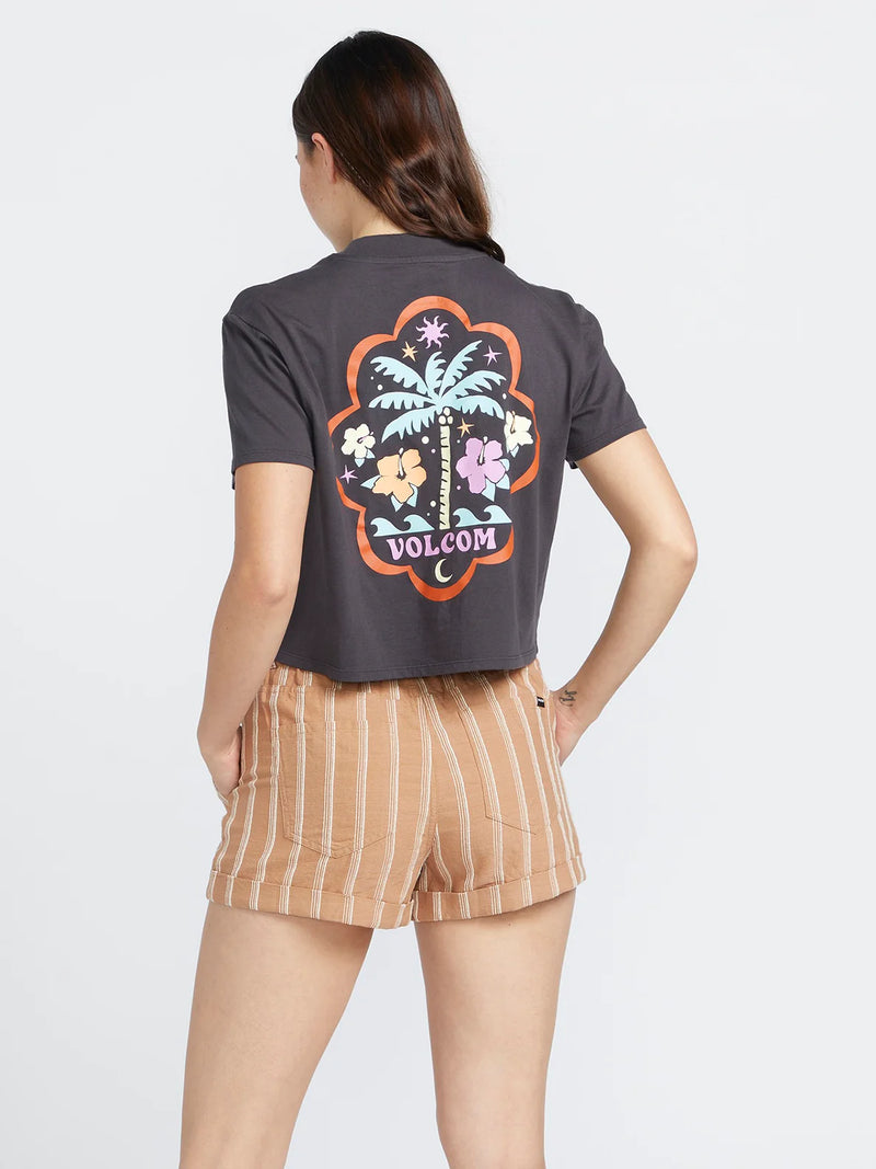 back view of the model wearing the sunday strut shorts. shows the pin striping detailing. also shows the back patch pockets and rolled cuffs. 