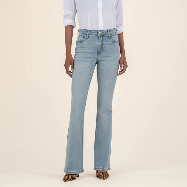 front view of the ana high rise flare jeans. shows the high waist. also shows the button/zipper closure, the front pockets, the belt loops and the flared leg. 