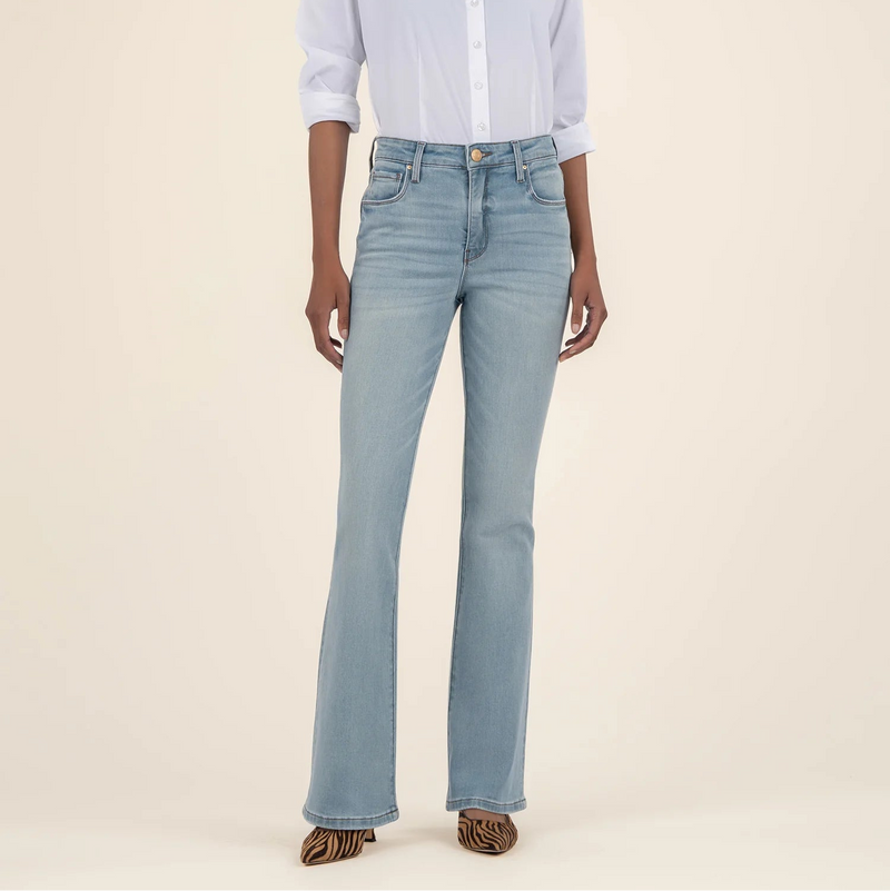 front view of the ana high rise flare jeans. shows the high waist. also shows the button/zipper closure, the front pockets, the belt loops and the flared leg. 