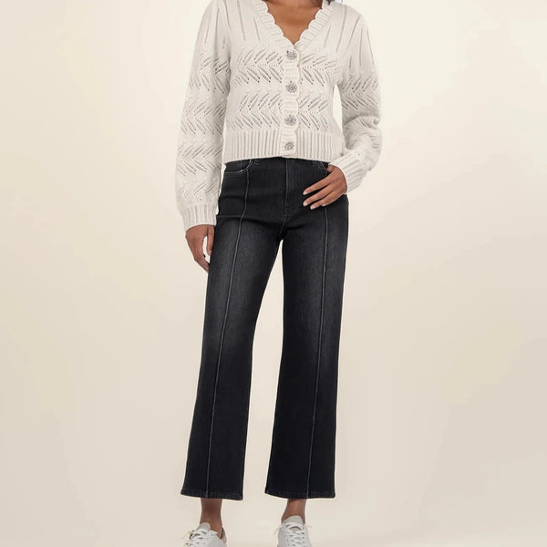 front view of the mimi scallop neck cardigan. shows the v neckline. also shows the scallop detailing, the crystal buttons, the cut details. 
