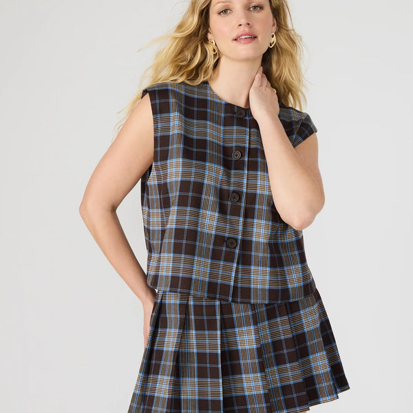 front view of the alessa top. shows the crew neckline. also shows he button down closure, the cap sleeves, & the plaid pattern.