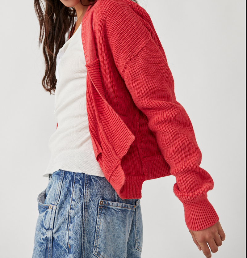 side view shows interior of cardigan appears the same color and texture to outside