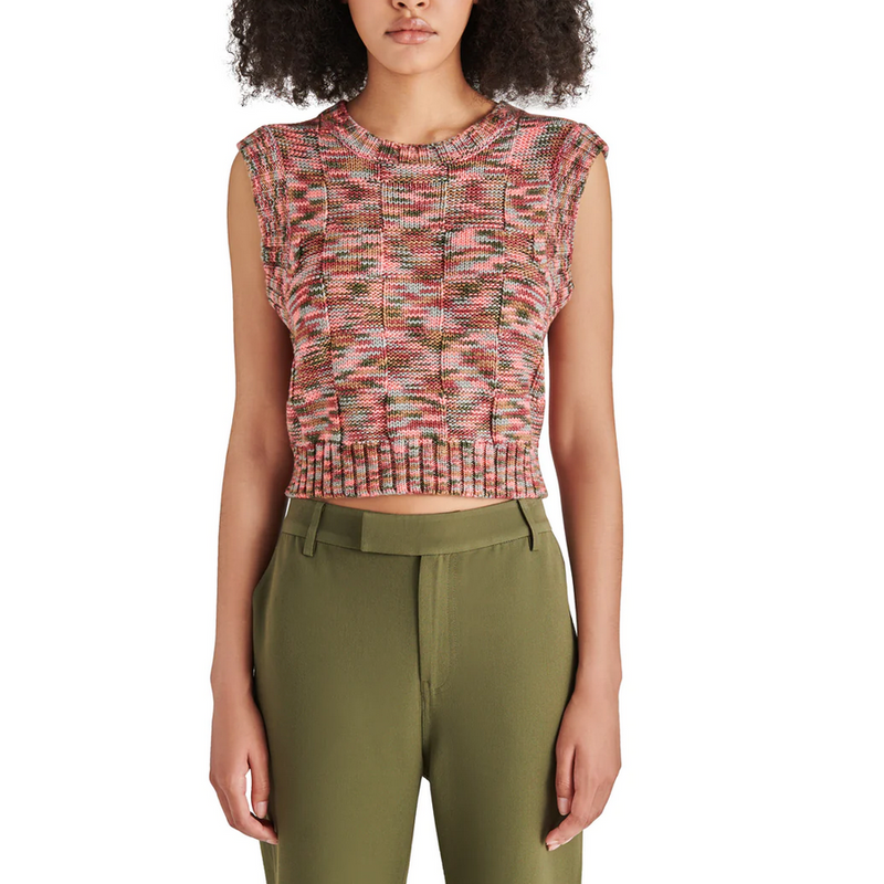 front view of model in sweater tank. shows the crew neckline, knit fabrication, multi colored yarn and contrast ribbing on hem and neck.