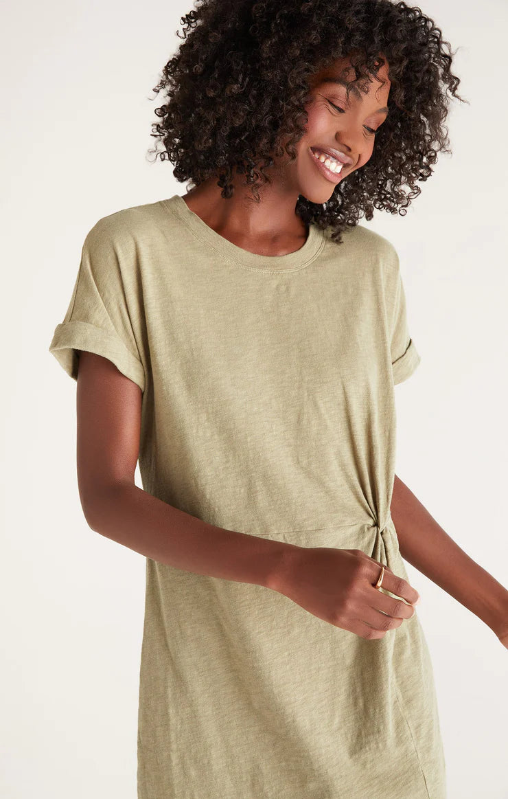 A closer look at the rolled sleeves and twist front detail.