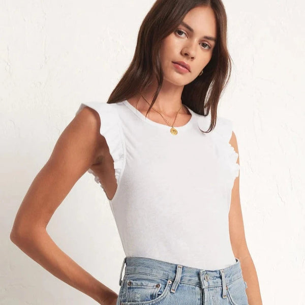 front view of the model wearing the marielle flutter tank. shows the soft crew neckline. also shows the flutter detail on the sleeves, and the slim fit. 