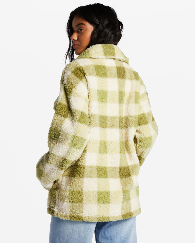 back view of model in jacket. shows the collar, dropped shoulders and oversized fit.