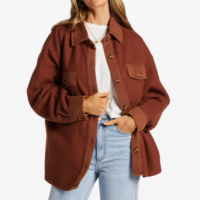 front view of model in shacket. shows the reversed fleece and mineral wash design. chest pockets are visible, as well as the buttons down the front and collar