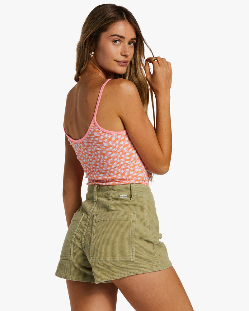 Back view of flamingo color tank. Shows the low scoop back and spaghetti straps.