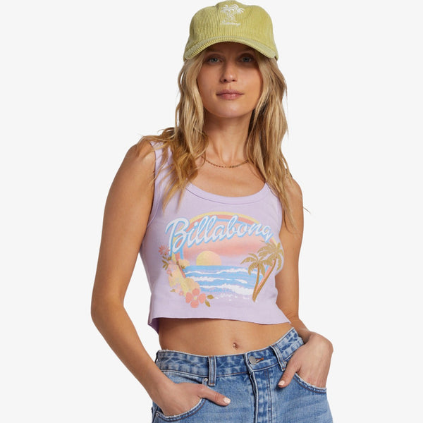 front view of the model wearing the wild waves t shirt. shows that the top is sleeveless. also shows the scopp neckline, the front graphic and the cropped length. 