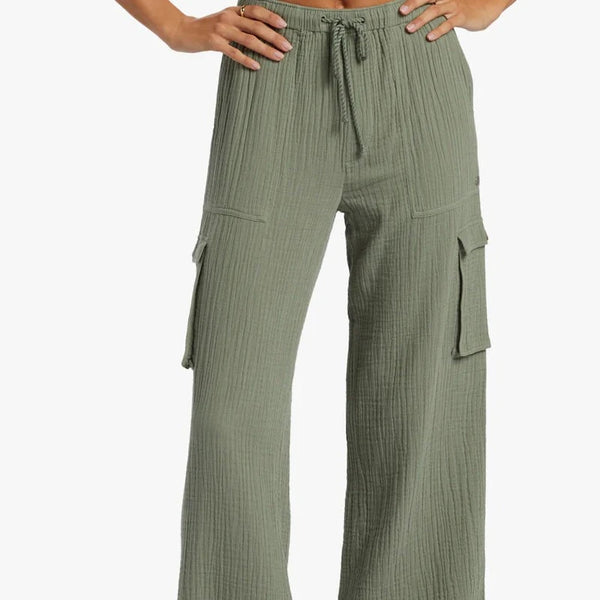 front view of the model wearing the precious high waisted cargo pants. shows the drawstring detail. also shows the side cargo pocket, the high waist length and the regular side pockets.