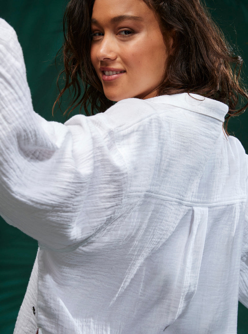 Close up back view of top. Horizontal seam across the back.