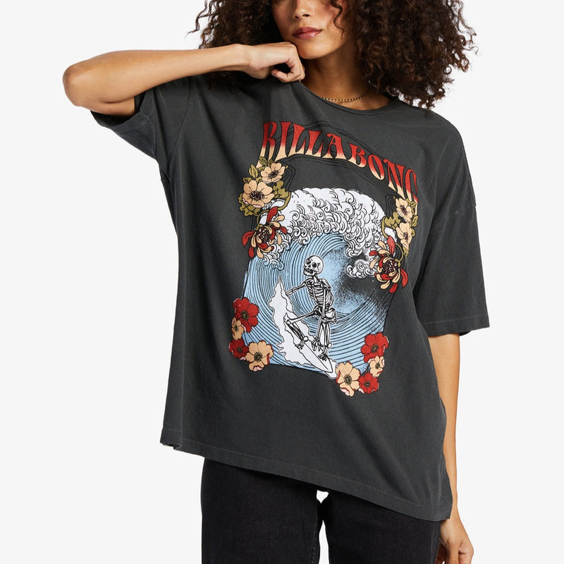 Front view of model wearing t shirt. Shows the crew neck. Also shows the short sleeves and awesome graphic. The shirt is an off black.