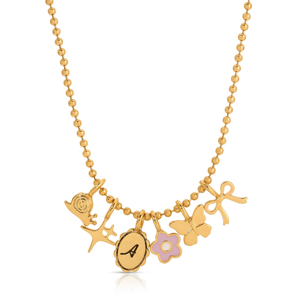 Front view of the gold necklace chain with the snail, sparkle, initial, flower, butterfly and bow bow gold charms. The chain is little gold balls.