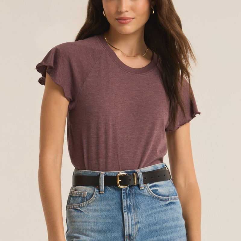 FRONT VIEW OF THE Model wearing the abby flutter slleve top. shows the flutter sleeve detail. also shows the crew neckline, the relaxed fit, and the short sleeve. 