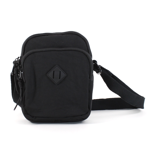 front view of jamie nylon crossbody in black. shows the black crossbody adjustable strap, the three zipper compartments and the black diamond detail on the front. 