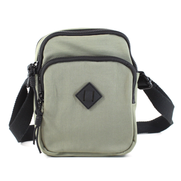 front view of the jamie nylon crossbody in green. you can see the three zipper closure compartments, the adjustable black crossbody strap, the black diamond detail on the front. 