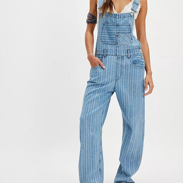 front view of the ziggy overalls. shows the striped design. also shows the adjustable straps, the front bib pocket, and the tapered legs. 