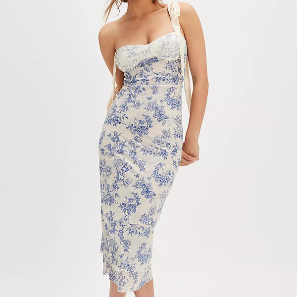 front view of the got glam slip dress. shows the sweetheart neckline. also shows the slim silhouette, the floral print, and the adjustable straps. 
