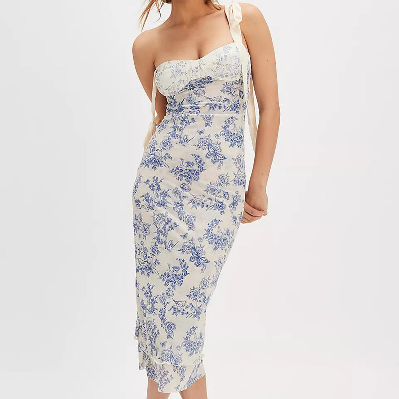 front view of the got glam slip dress. shows the sweetheart neckline. also shows the slim silhouette, the floral print, and the adjustable straps. 
