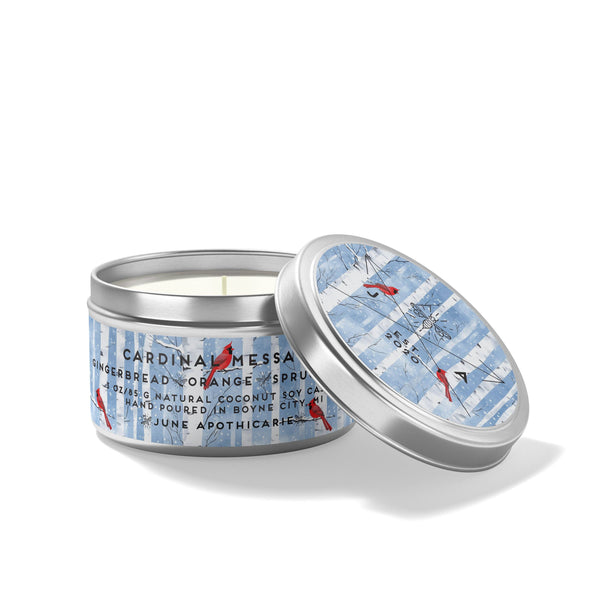 Candle tin with a decorative label on a white background