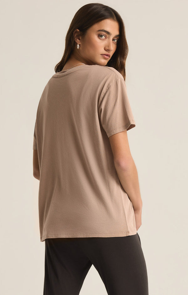 back view of the model wearing the sunday funday boyfriend tee. shows the oversized fit. also shows the oversized fit. 