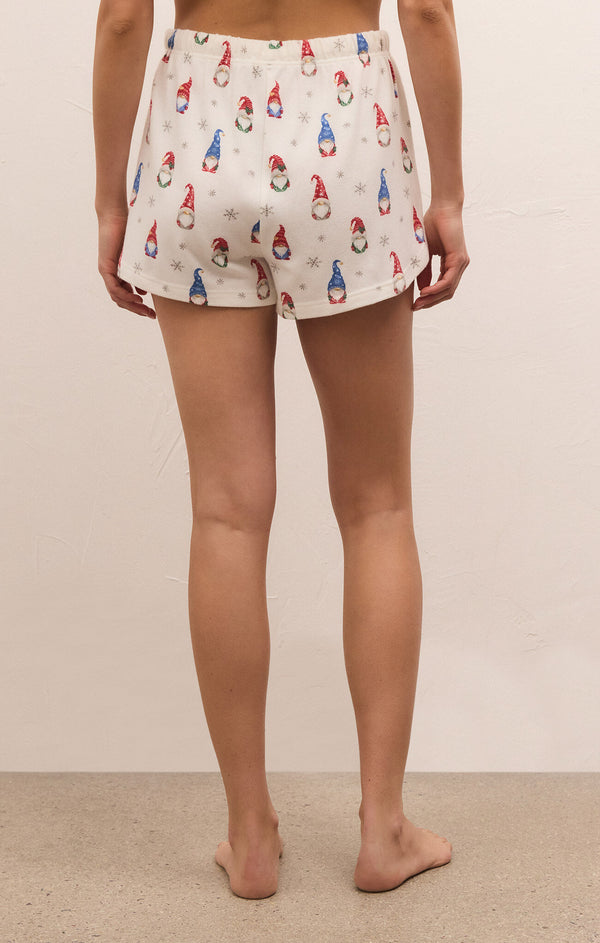 back view of the classic gnome shorts in vanilla ice. shows the mid rise. also shows the cutest gnome print throughout, and the length of them are short.
