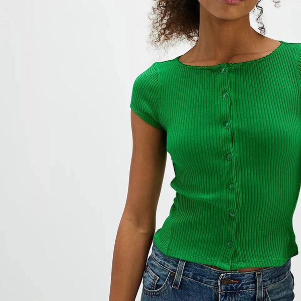 shows model wearing the green button down cardi, with picot trim and ribbed detailing. 