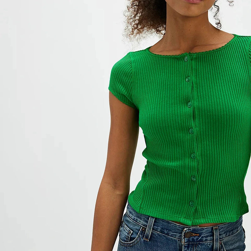 shows model wearing the green button down cardi, with picot trim and ribbed detailing. 