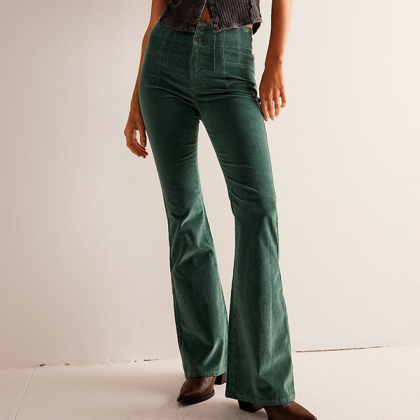 Hunter green  courdoroy flare pants- close up of front leg showcases pintucked front pandel, two button zip fly and flare leg