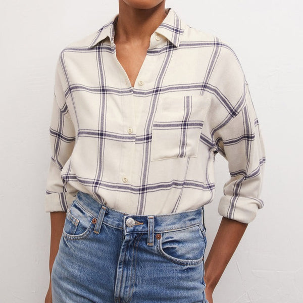 Front view of model button up. Shows the button closure. Also, shows the collar neckline and the front breast pocket. 