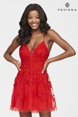 shows front view of red a-line cocktail dress. dress features tulle with leaf lace applique, plunging v-neckline, mesh insert, and flowing skirt hitting mid-thigh.