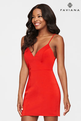 shows front view of fitted red cocktail dress. dress features v-neckline, banded waistline, and length hitting mid-thigh. 