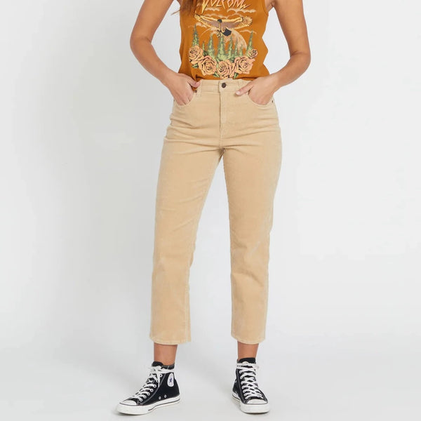 front view of the stoned straight pants in khaki. shows the high rise of the pant. also shows the zipper fly, the cropped length and the two front pockets. 