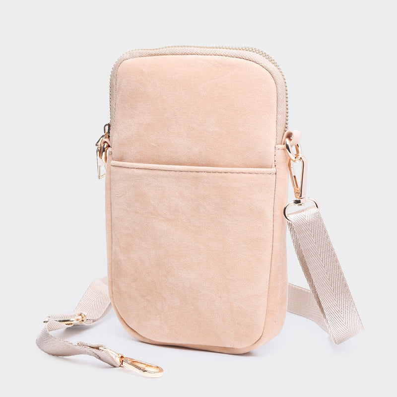 Front view of crossbody. Shows the zipper closure. Also shows the front pocket, the adjustable and detachable strap in this beige color.