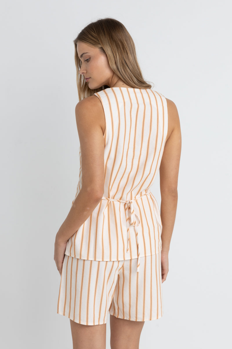 back view of the tide stripe long vest. shows the tie back detail. also shows the vertical stripes, and the longer length. 