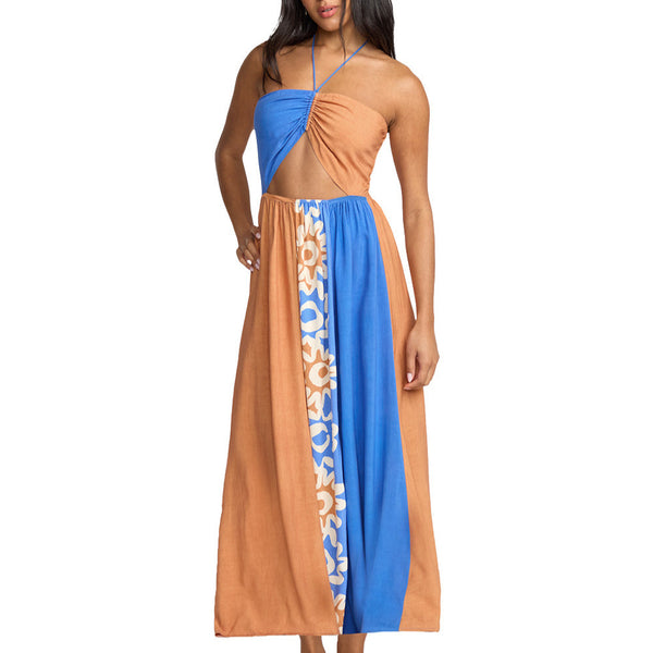 Woman wearing a two-tone dress with brown and blue colors on a white background