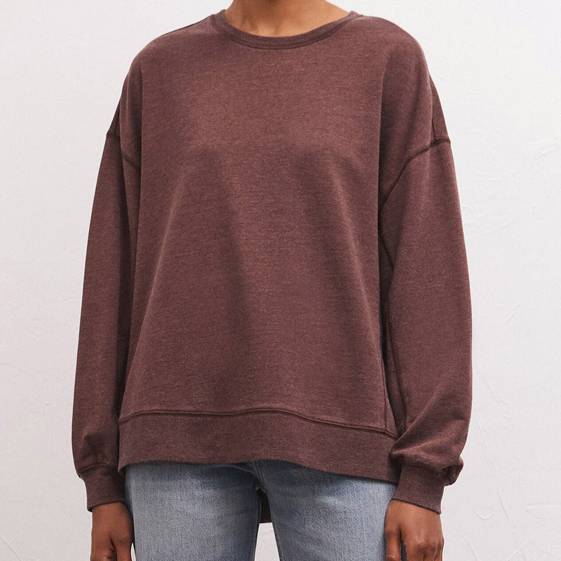 Front view of model wearing weekender. Shows the crew neckline. Also shows the oversized fit, the long sleeves and this beautiful dark truffle color. 
