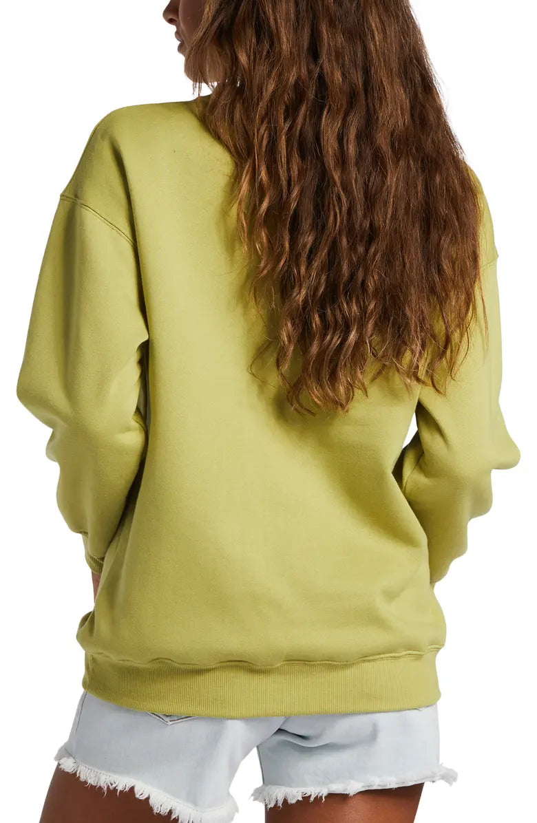 back view of crewneck sweatshirt with ribbed cuffs and hem, back is plain.