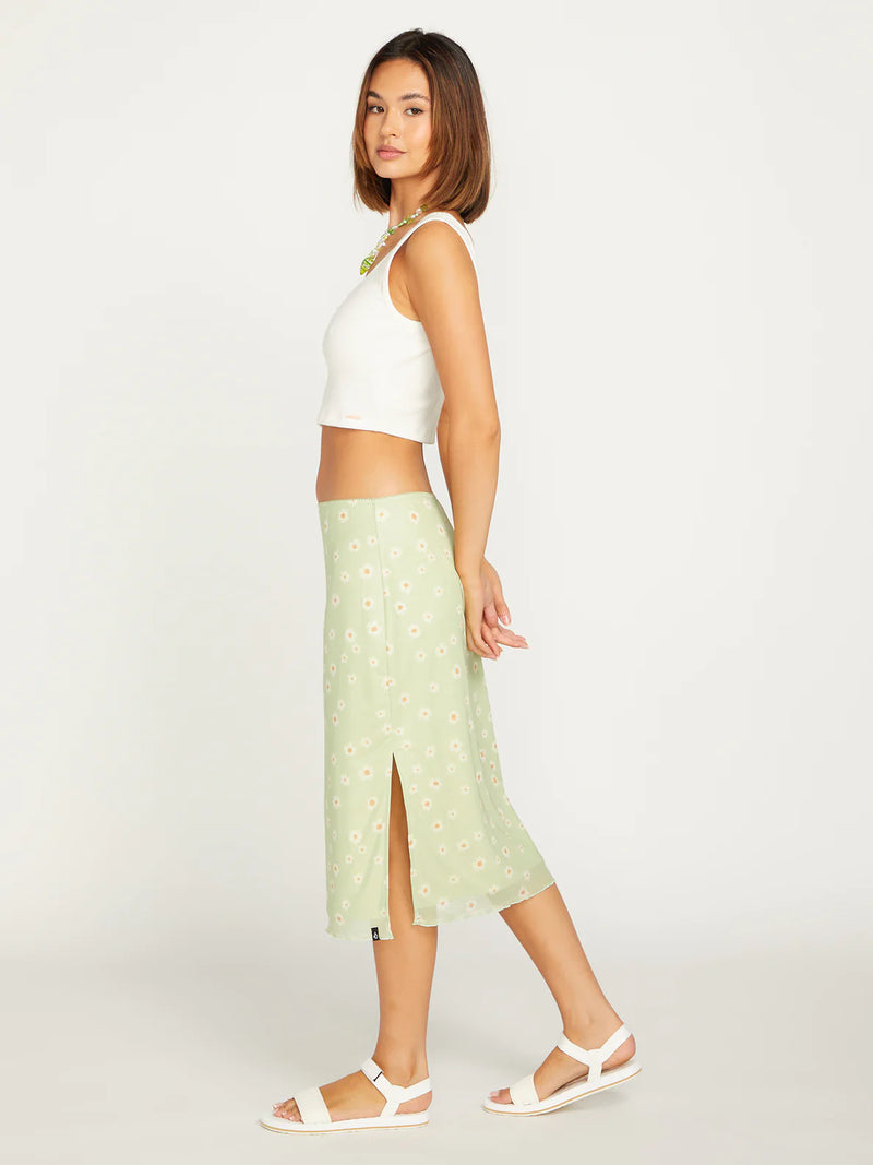 side view of the skirt. shows the side slit and low waist. hits model about mid shin.