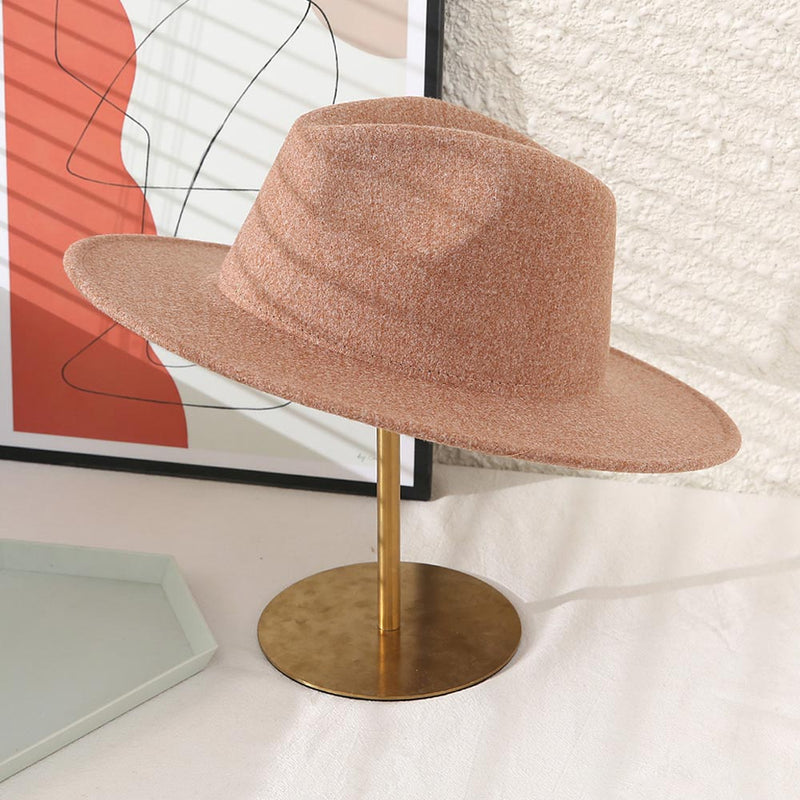 Brown wool hat with wide brim and dent down the center.